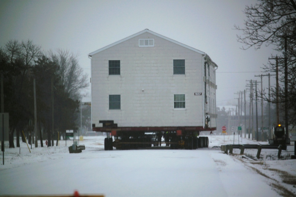 Workers successfully move second World War II barracks at Fort McCoy; preparations under way to move third building