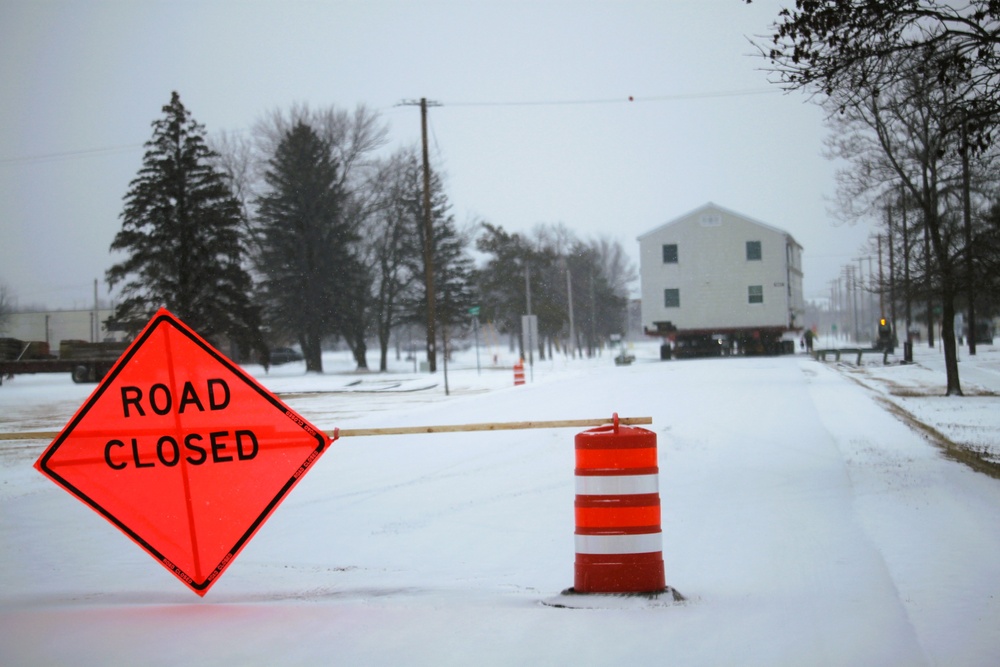 Workers successfully move second World War II barracks at Fort McCoy; preparations under way to move third building