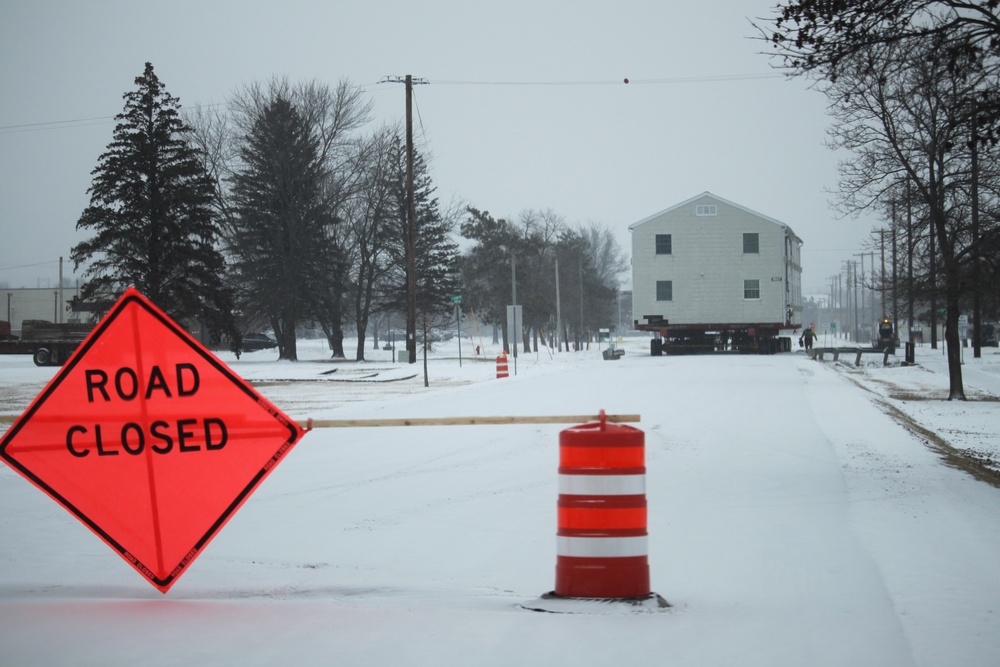 Workers successfully move second World War II barracks at Fort McCoy; preparations under way to move third building