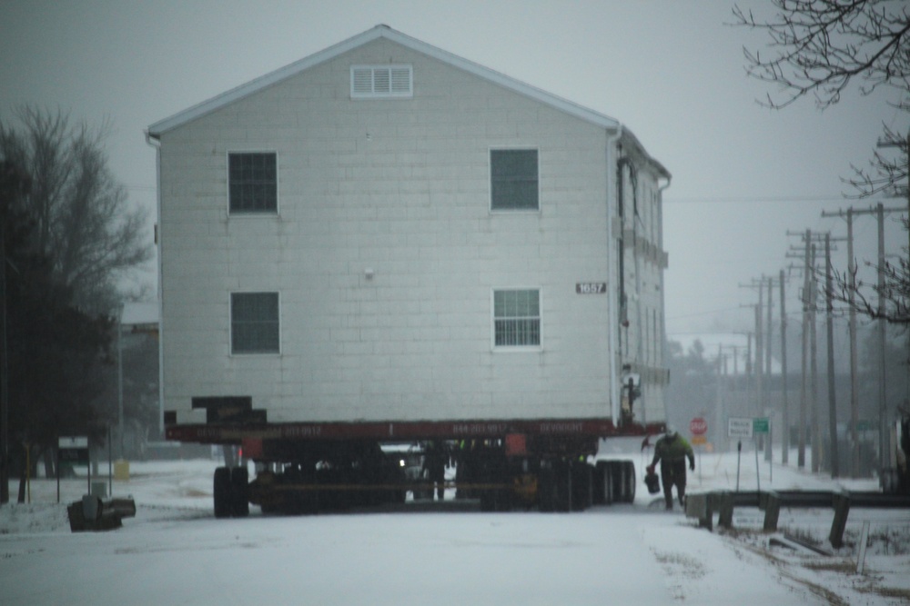 Workers successfully move second World War II barracks at Fort McCoy; preparations under way to move third building