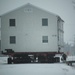 Workers successfully move second World War II barracks at Fort McCoy; preparations under way to move third building