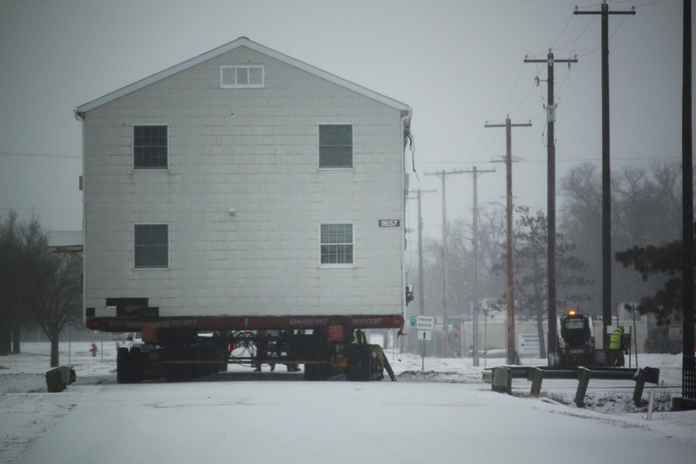 Workers successfully move second World War II barracks at Fort McCoy; preparations under way to move third building