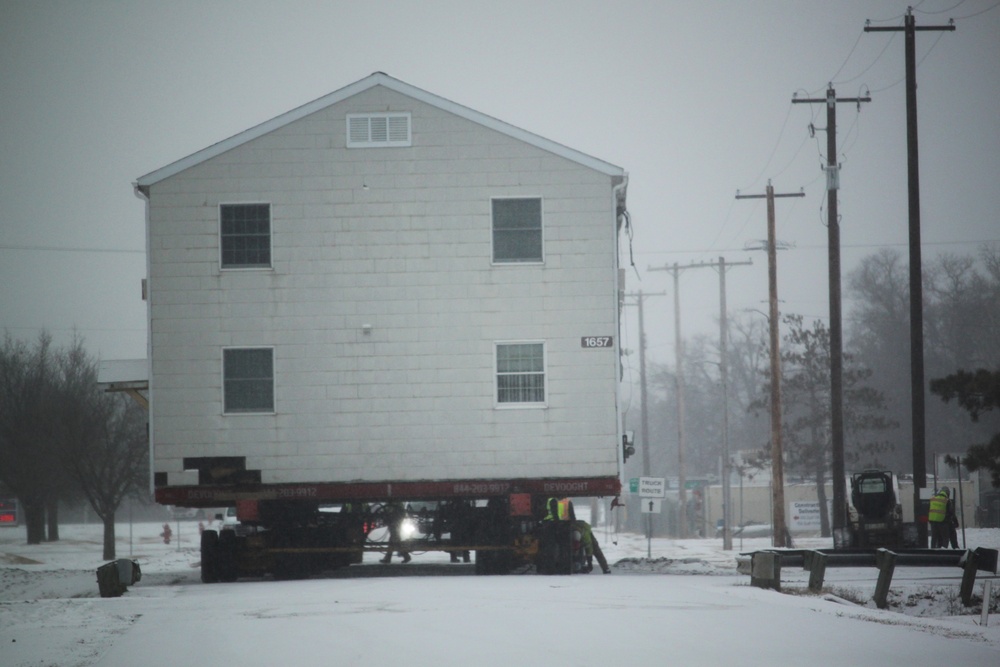 Workers successfully move second World War II barracks at Fort McCoy; preparations under way to move third building