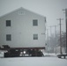 Workers successfully move second World War II barracks at Fort McCoy; preparations under way to move third building