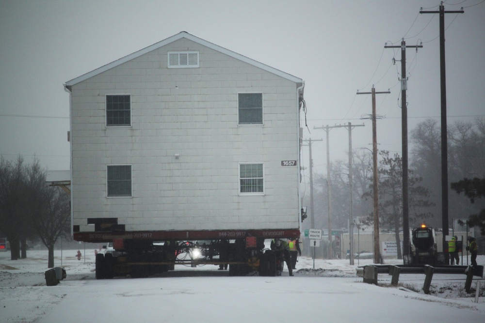 Workers successfully move second World War II barracks at Fort McCoy; preparations under way to move third building