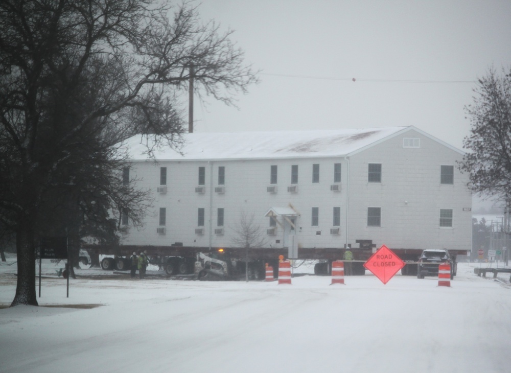 Workers successfully move second World War II barracks at Fort McCoy; preparations under way to move third building