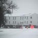 Workers successfully move second World War II barracks at Fort McCoy; preparations under way to move third building