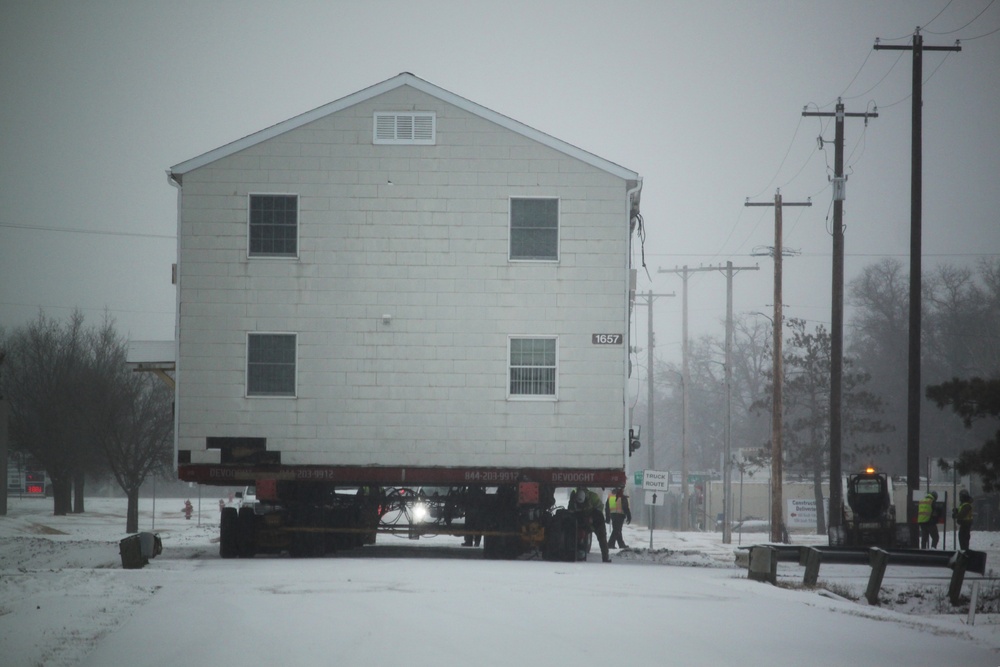 Workers successfully move second World War II barracks at Fort McCoy; preparations under way to move third building