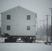 Workers successfully move second World War II barracks at Fort McCoy; preparations under way to move third building