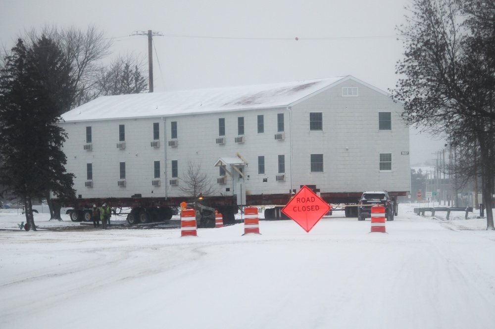 Workers successfully move second World War II barracks at Fort McCoy; preparations under way to move third building