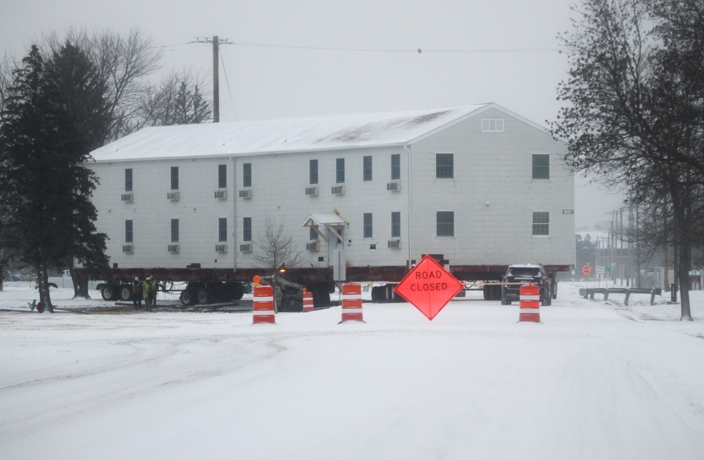 Workers successfully move second World War II barracks at Fort McCoy; preparations under way to move third building