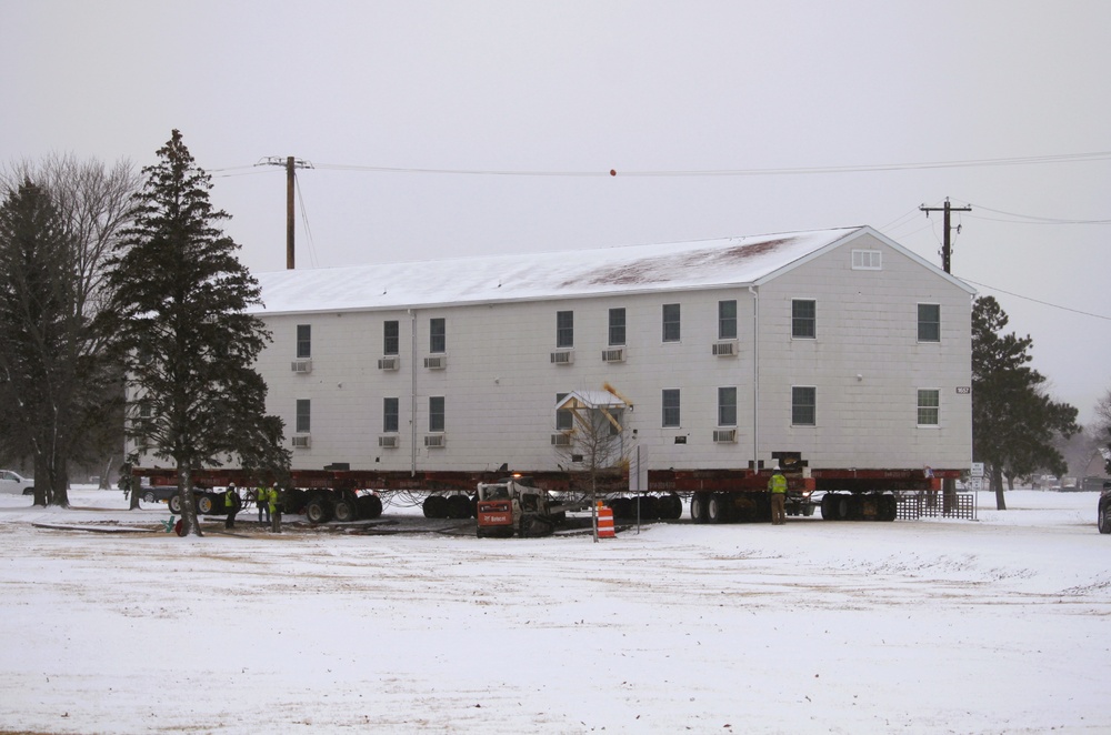 Workers successfully move second World War II barracks at Fort McCoy; preparations under way to move third building