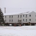 Workers successfully move second World War II barracks at Fort McCoy; preparations under way to move third building