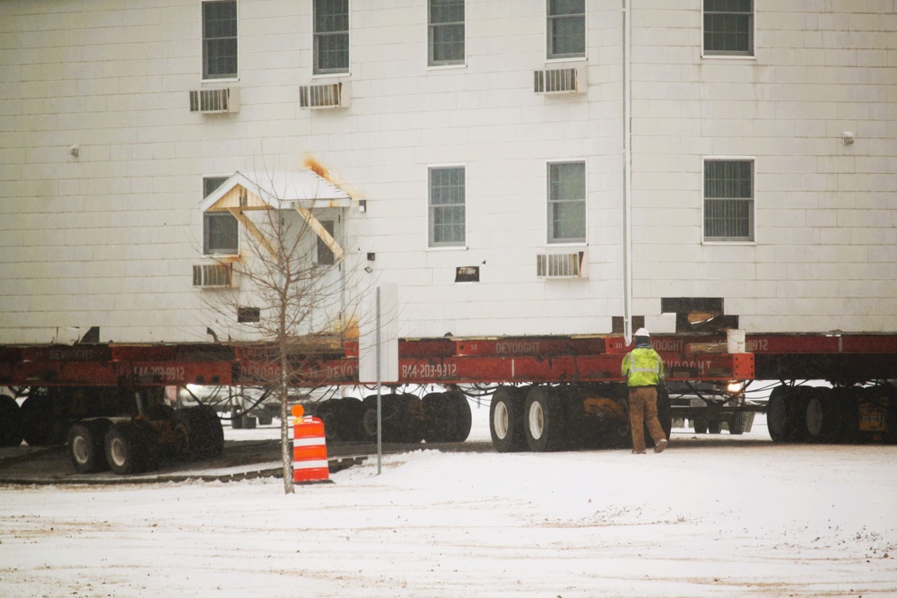 Workers successfully move second World War II barracks at Fort McCoy; preparations under way to move third building