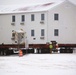 Workers successfully move second World War II barracks at Fort McCoy; preparations under way to move third building