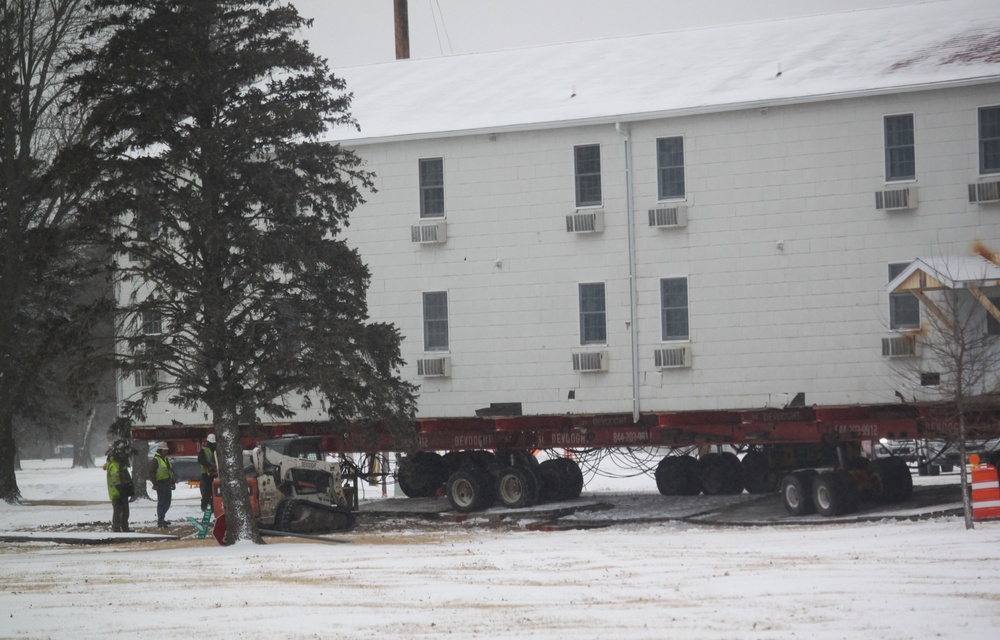 Workers successfully move second World War II barracks at Fort McCoy; preparations under way to move third building