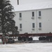 Workers successfully move second World War II barracks at Fort McCoy; preparations under way to move third building