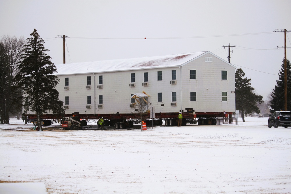 Workers successfully move second World War II barracks at Fort McCoy; preparations under way to move third building