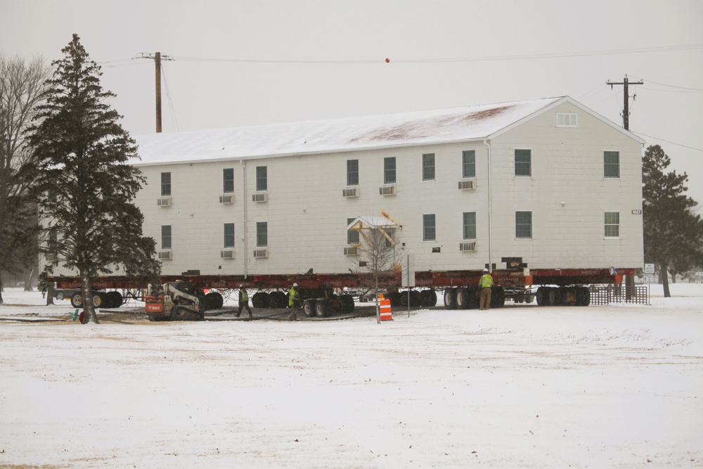 Workers successfully move second World War II barracks at Fort McCoy; preparations under way to move third building