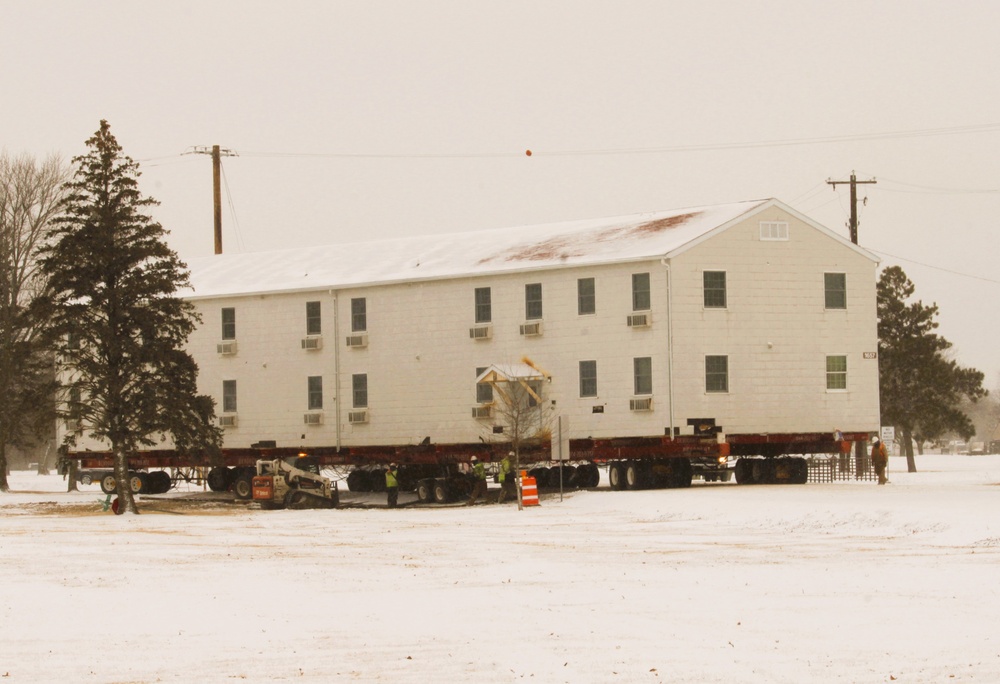 Workers successfully move second World War II barracks at Fort McCoy; preparations under way to move third building