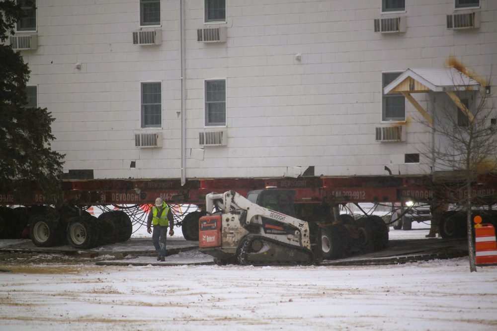 Workers successfully move second World War II barracks at Fort McCoy; preparations under way to move third building