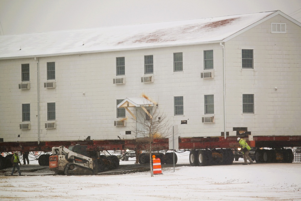 Workers successfully move second World War II barracks at Fort McCoy; preparations under way to move third building