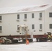 Workers successfully move second World War II barracks at Fort McCoy; preparations under way to move third building