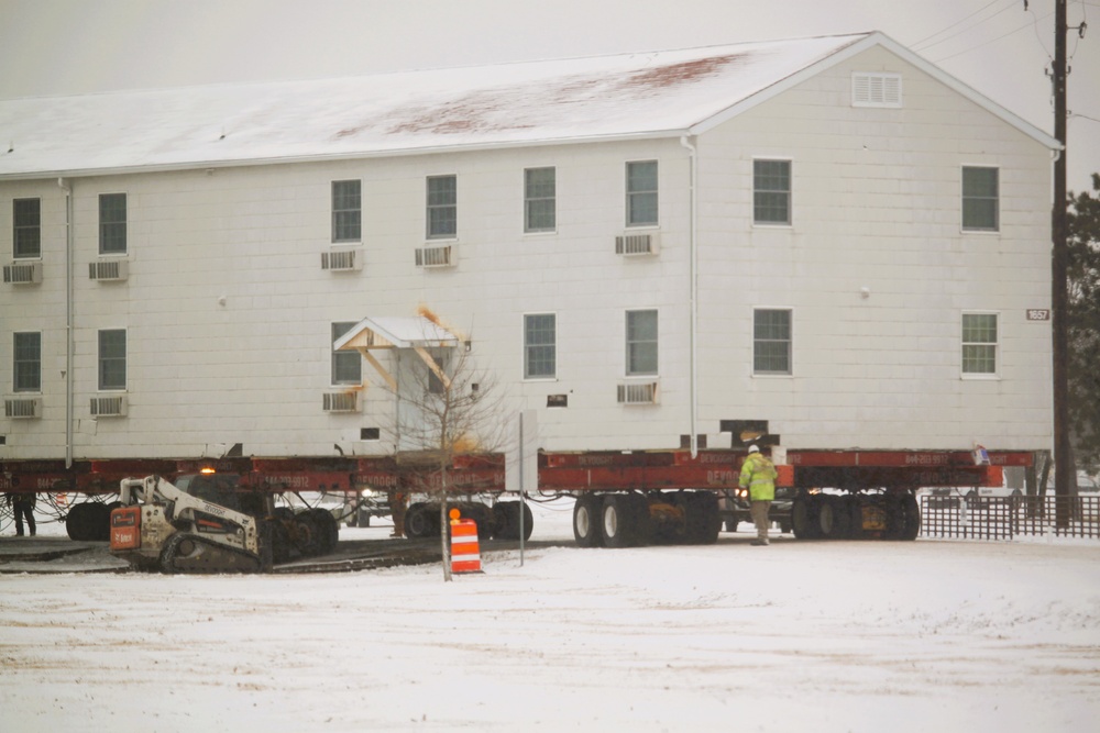 Workers successfully move second World War II barracks at Fort McCoy; preparations under way to move third building