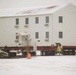 Workers successfully move second World War II barracks at Fort McCoy; preparations under way to move third building