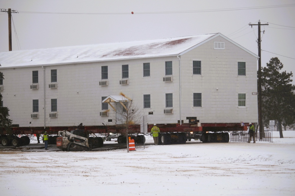 Workers successfully move second World War II barracks at Fort McCoy; preparations under way to move third building