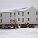 Workers successfully move second World War II barracks at Fort McCoy; preparations under way to move third building