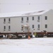 Workers successfully move second World War II barracks at Fort McCoy; preparations under way to move third building