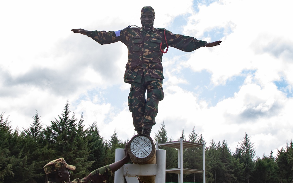 Multinational partners take part in obstacle course training at Justified Accord