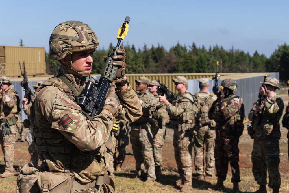 UK advisors guide partner forces in urban operations drills at Justified Accord