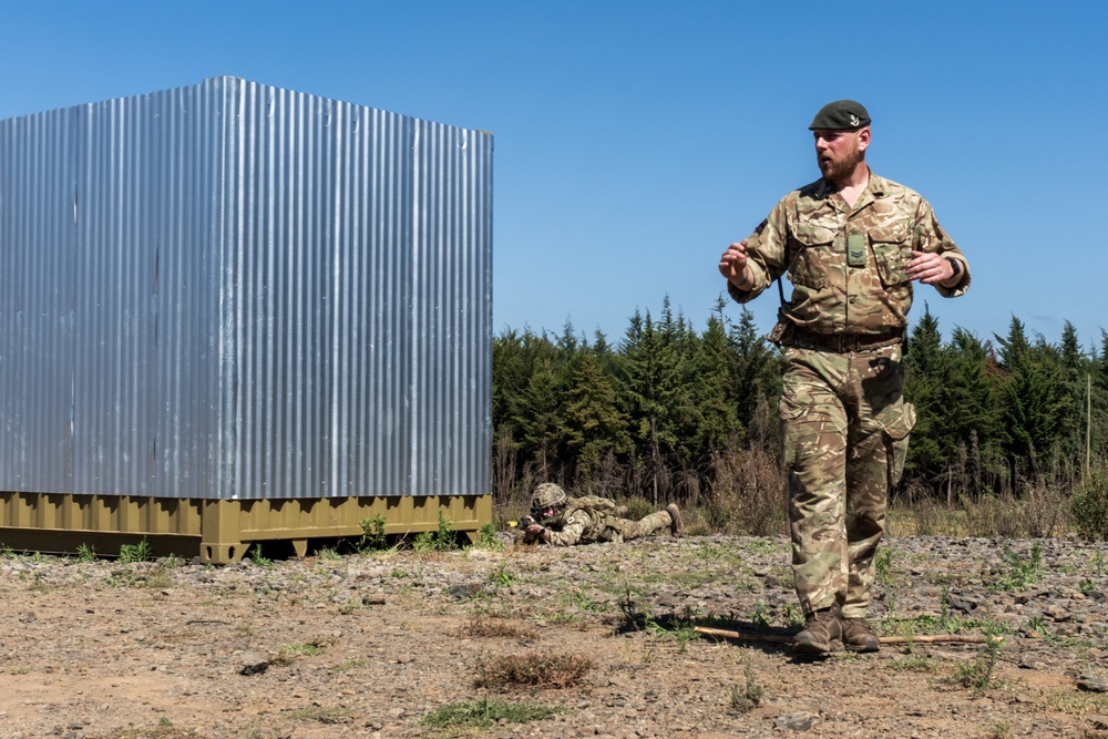UK advisors guide partner forces in urban operations drills at Justified Accord