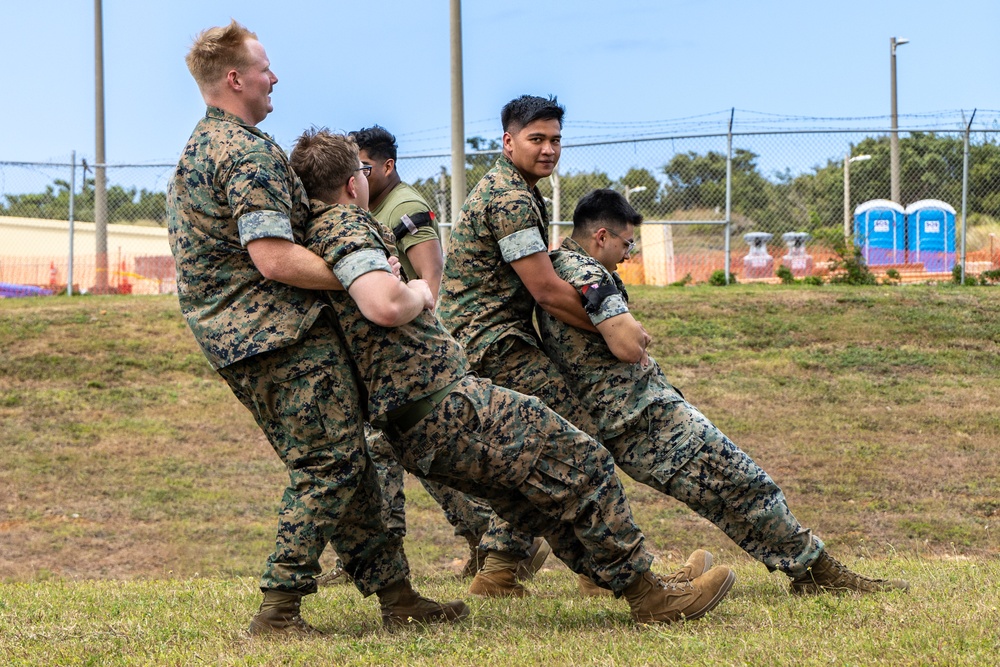 U.S. Marines simulate aiding casualties during Cope North 25