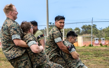 U.S. Marines simulate aiding casualties during Cope North 25