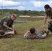 U.S. Marines simulate aiding casualties during Cope North 25