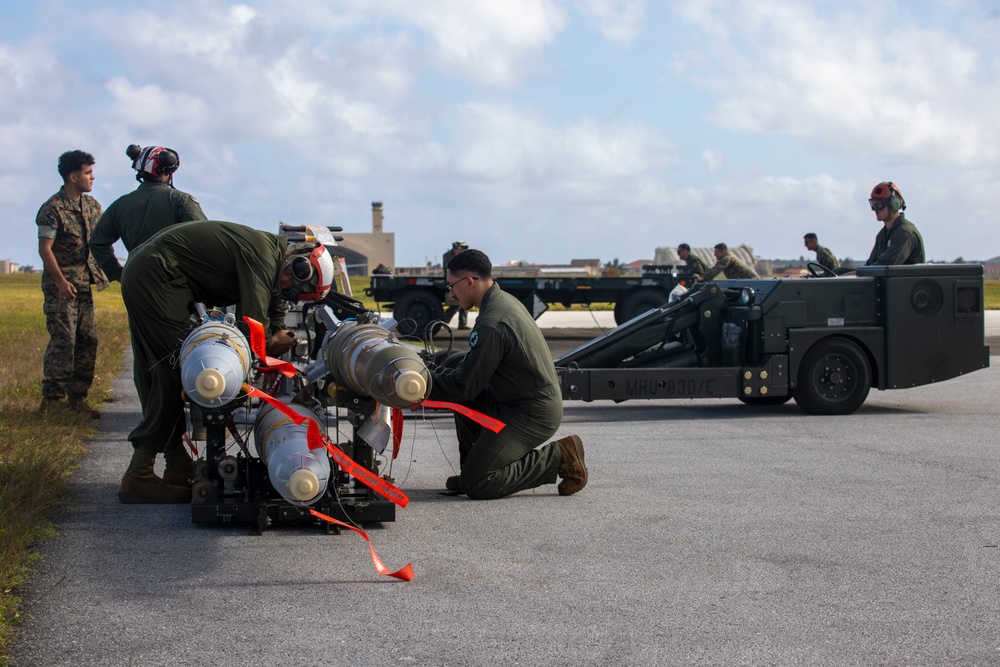 U.S. Marines deliver and stage bombs during Cope North 25