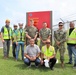 Contractors and Military Personnel Pose in Front of the New EOD Building on Camp Blaz