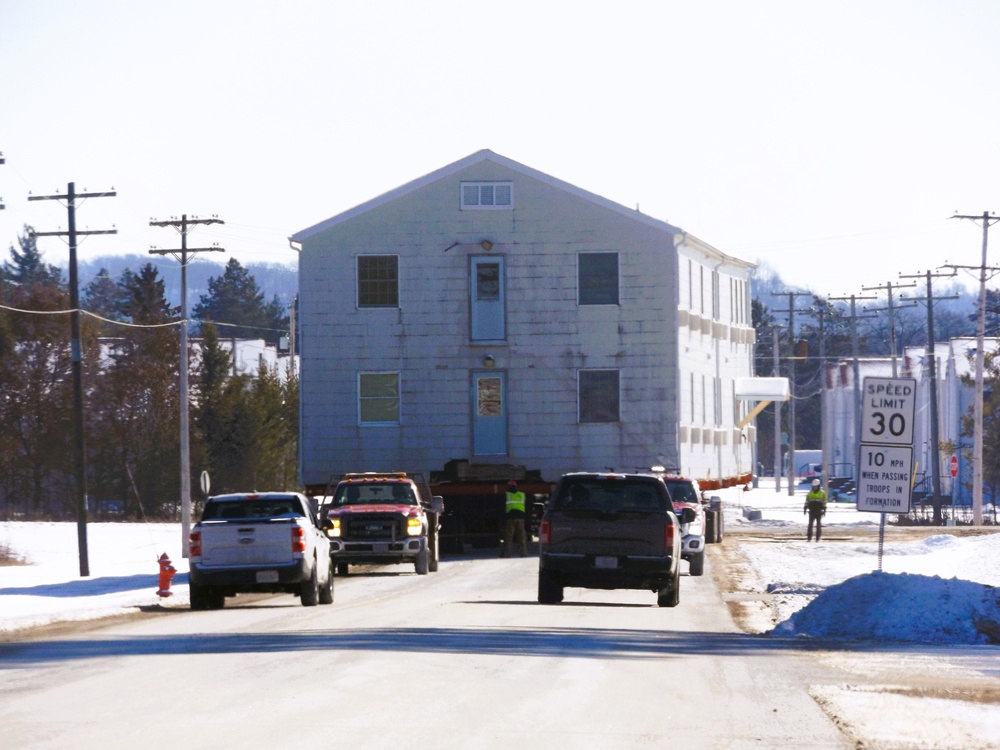 Workers successfully move second World War II barracks at Fort McCoy; preparations under way to move third building