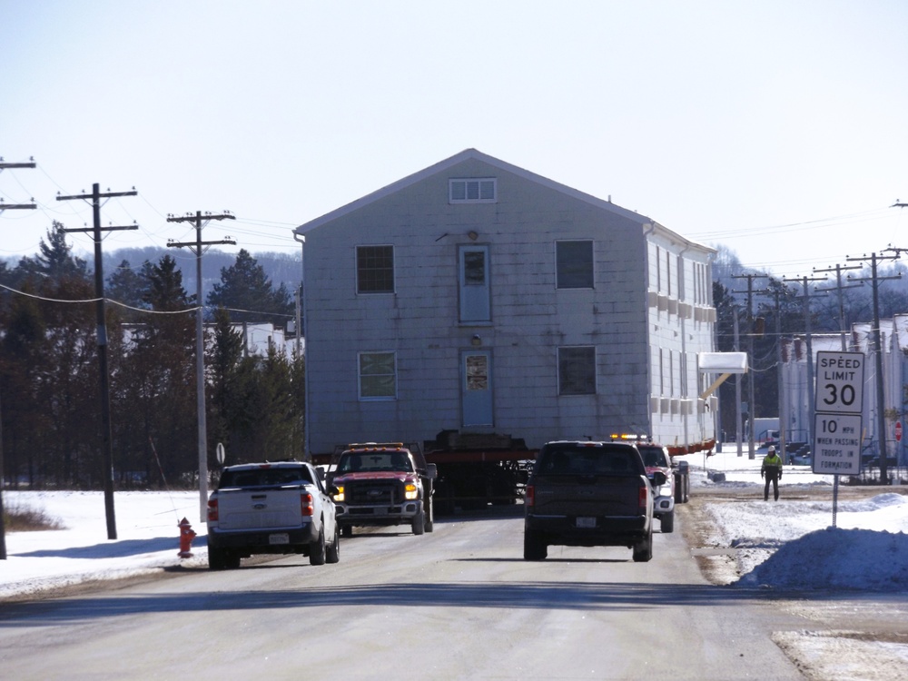 Workers successfully move second World War II barracks at Fort McCoy; preparations under way to move third building