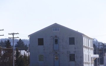 Workers successfully move second World War II barracks at Fort McCoy; preparations under way to move third building