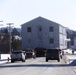 Workers successfully move second World War II barracks at Fort McCoy; preparations under way to move third building