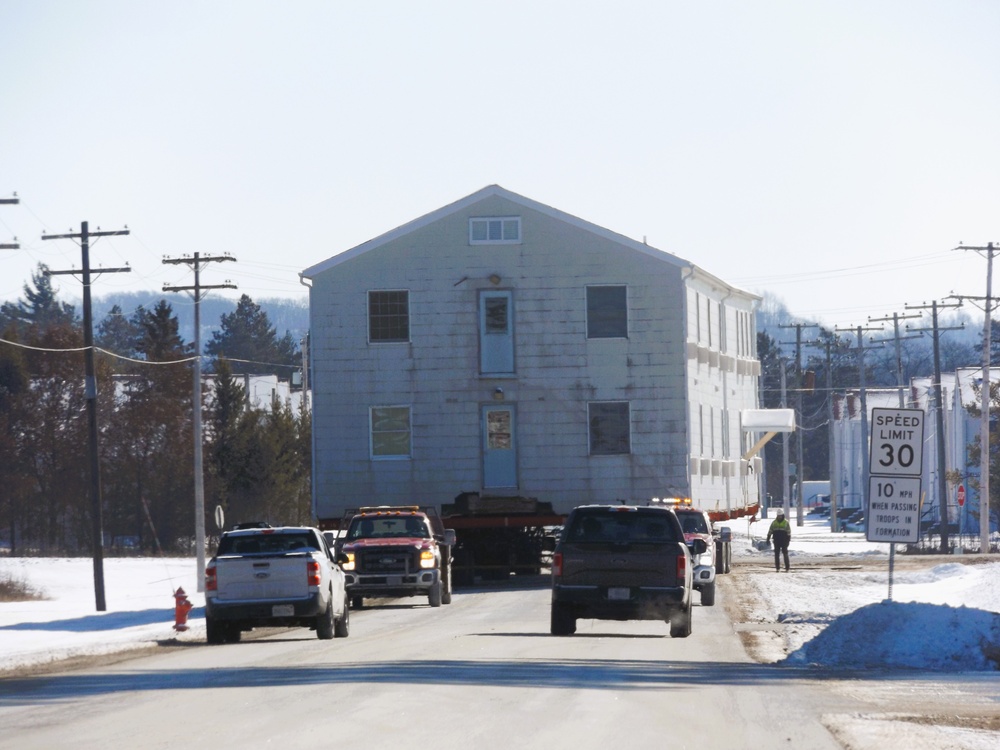 Workers successfully move second World War II barracks at Fort McCoy; preparations under way to move third building