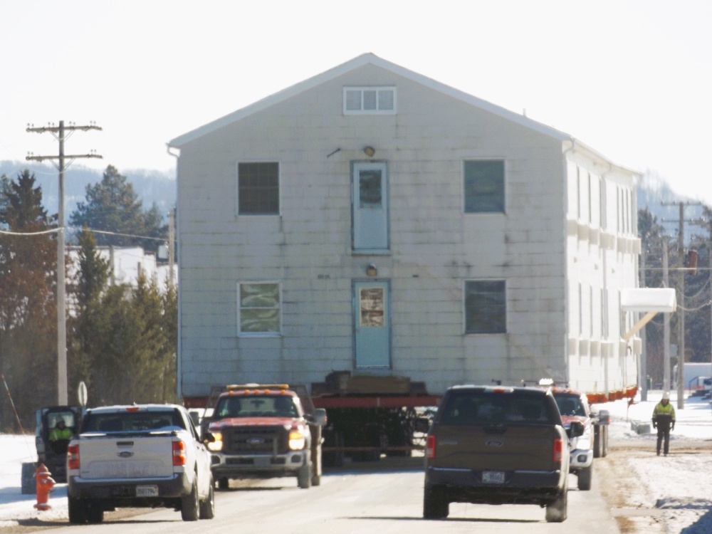 Workers successfully move second World War II barracks at Fort McCoy; preparations under way to move third building