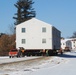 Workers successfully move second World War II barracks at Fort McCoy; preparations under way to move third building