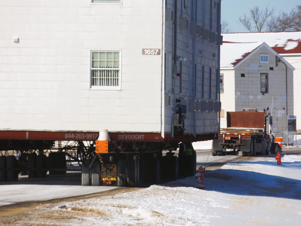 Workers successfully move second World War II barracks at Fort McCoy; preparations under way to move third building