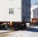 Workers successfully move second World War II barracks at Fort McCoy; preparations under way to move third building