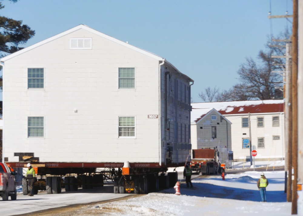 Workers successfully move second World War II barracks at Fort McCoy; preparations under way to move third building